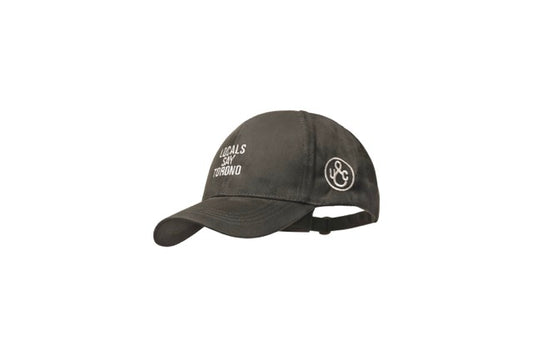 Close-up of embroidered Local Say Torono wordmark on microsuede cap